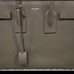 A basically new Saint Laurent large Tote bag w/crossbody strap.